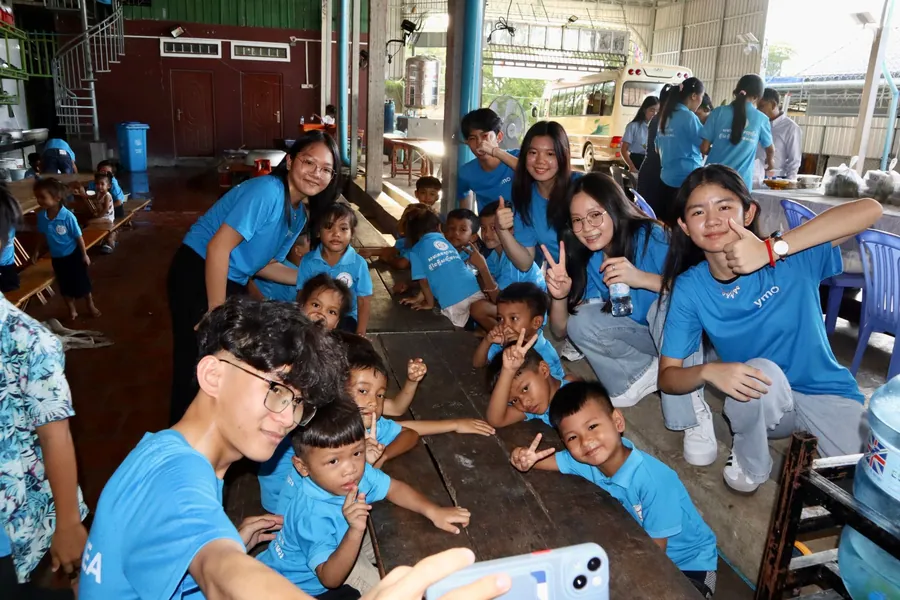 The YMO team with children on the Charity Tour